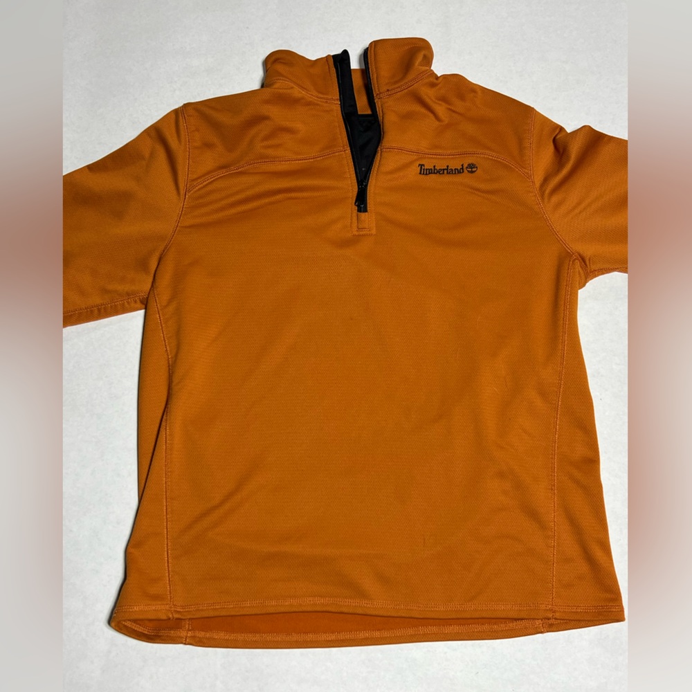 Orange Timberland 1/4 zip pull over size medium.